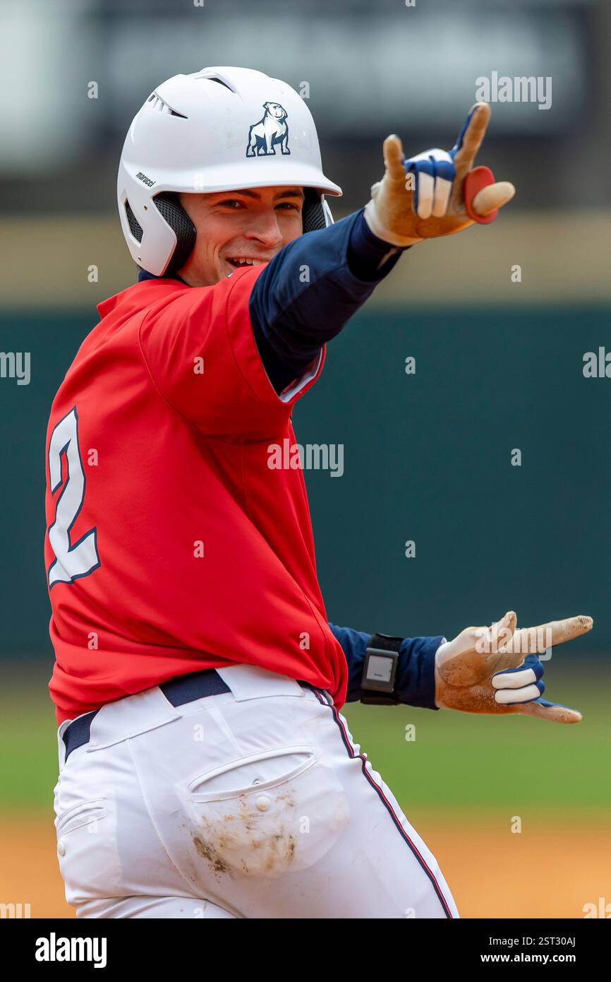 Samford pitcher/infielder Cade Carr (2) celebrates a grand slam home ...