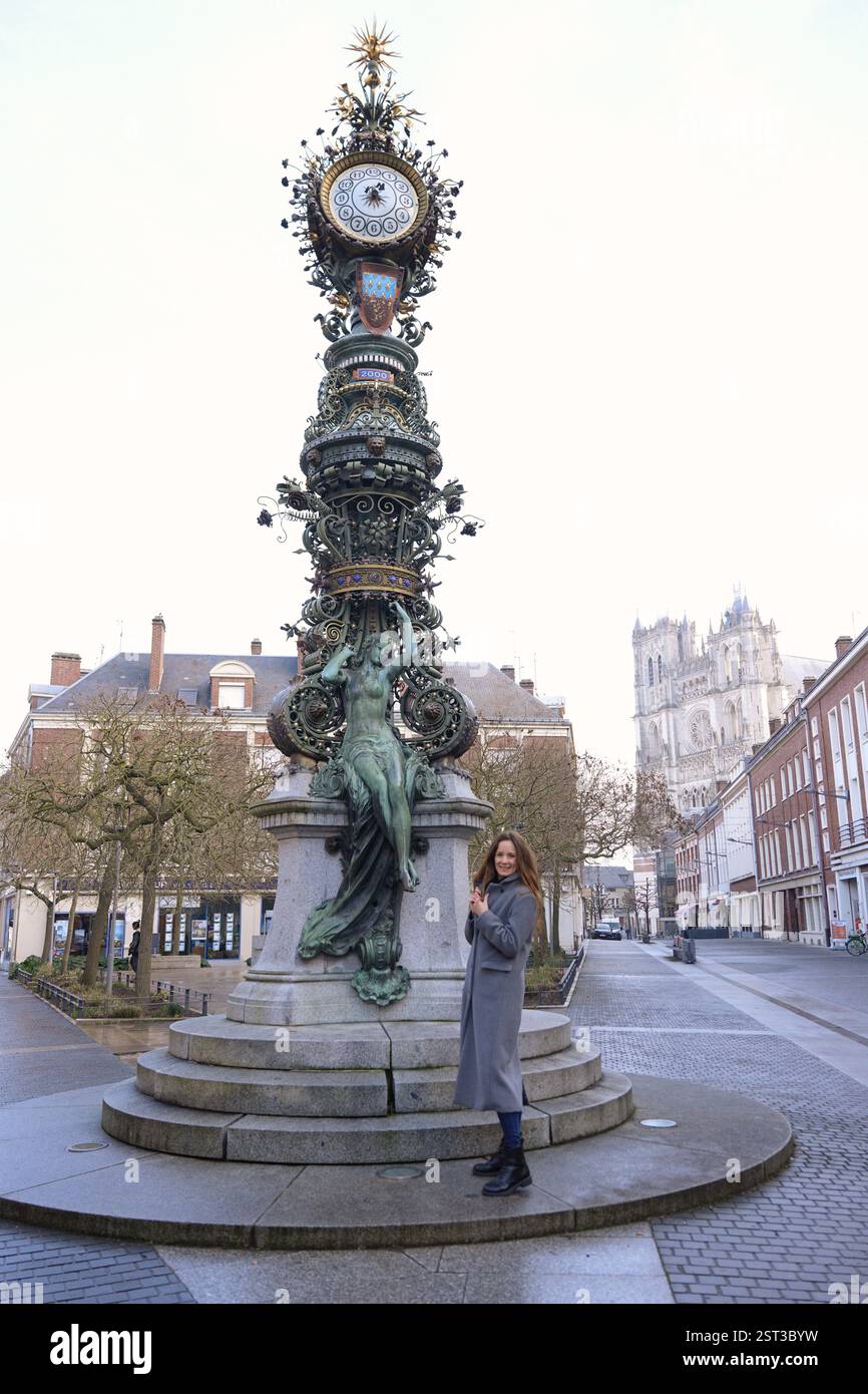 Woman standing next cathedral hi-res stock photography and images - Alamy
