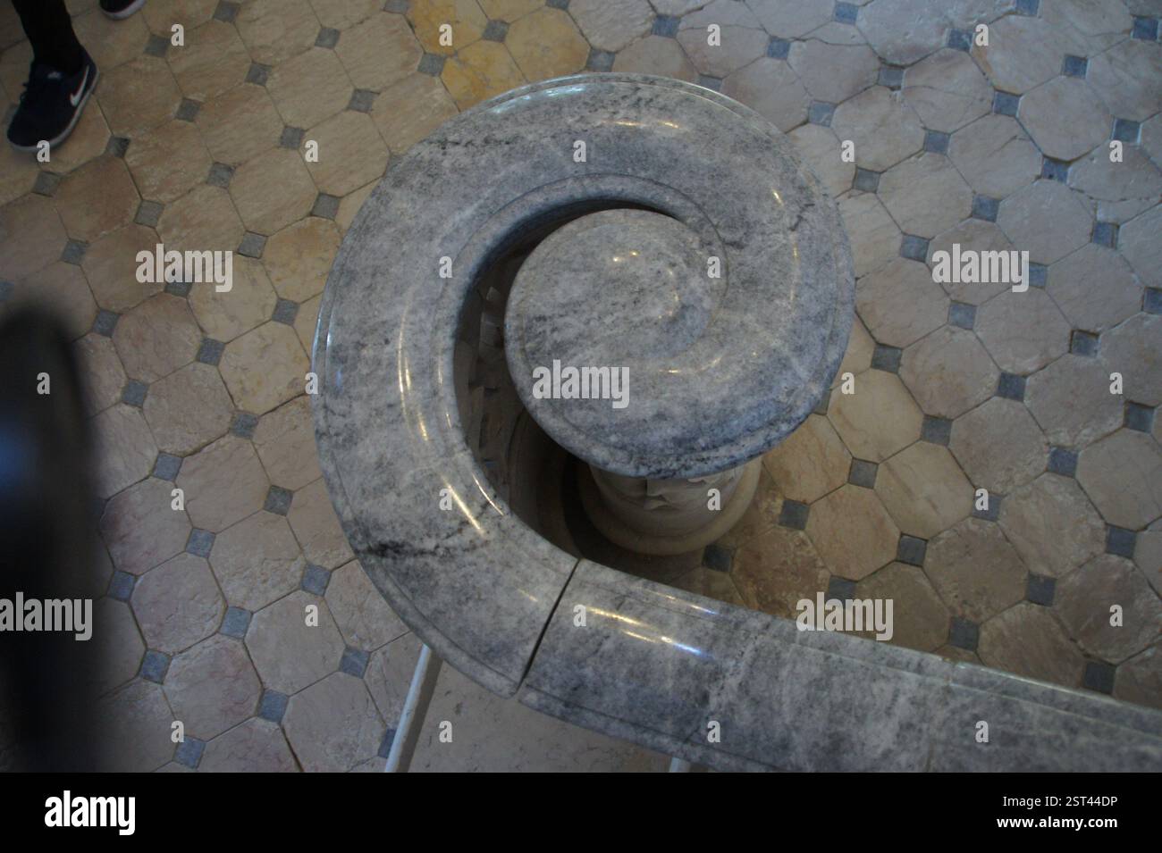 Marble handrail with intricate spiral design. Luxurious craftsmanship ...