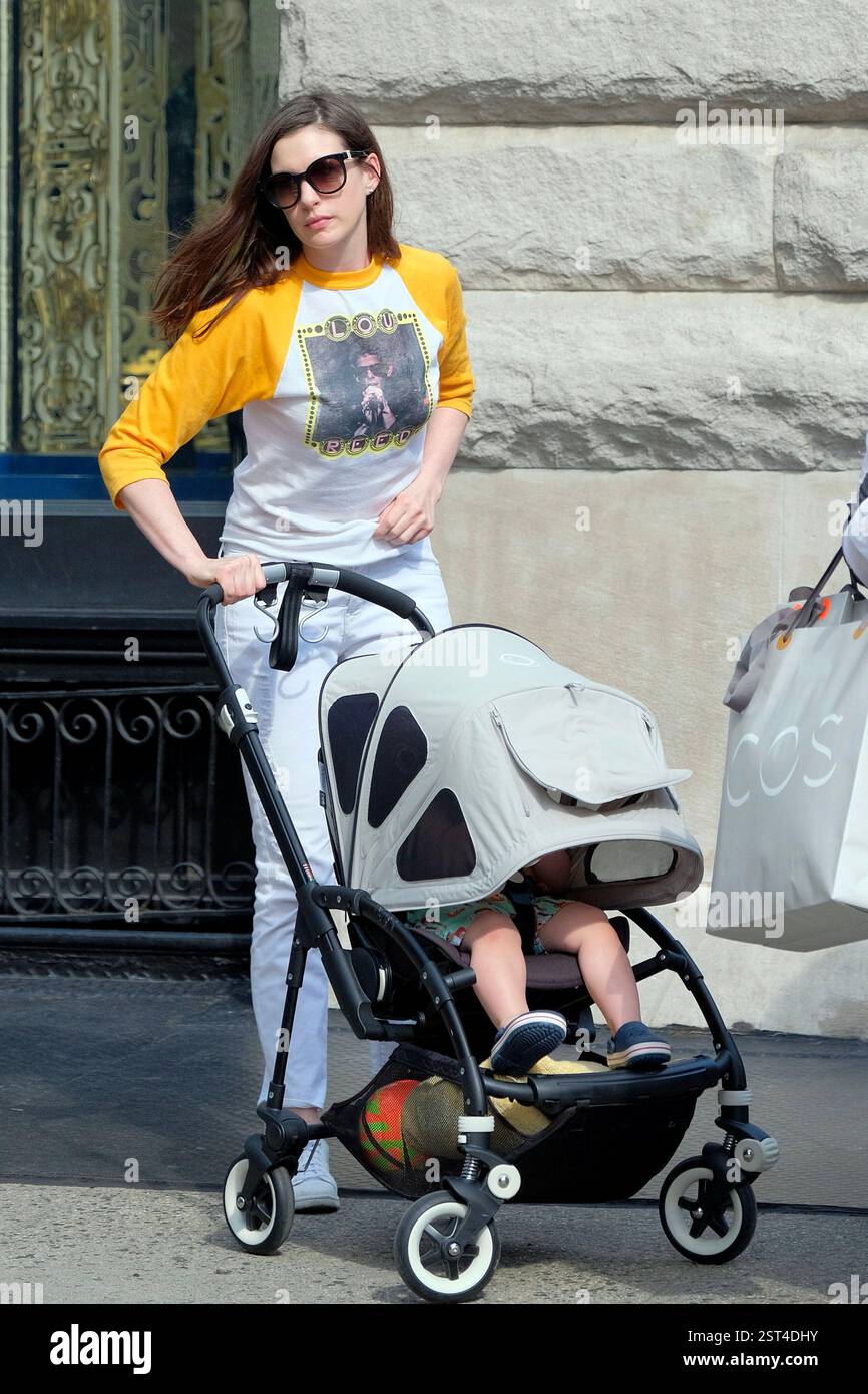 actress-anne-hathaway-walks-in-soho-with-her-husband-adam-shulman-and