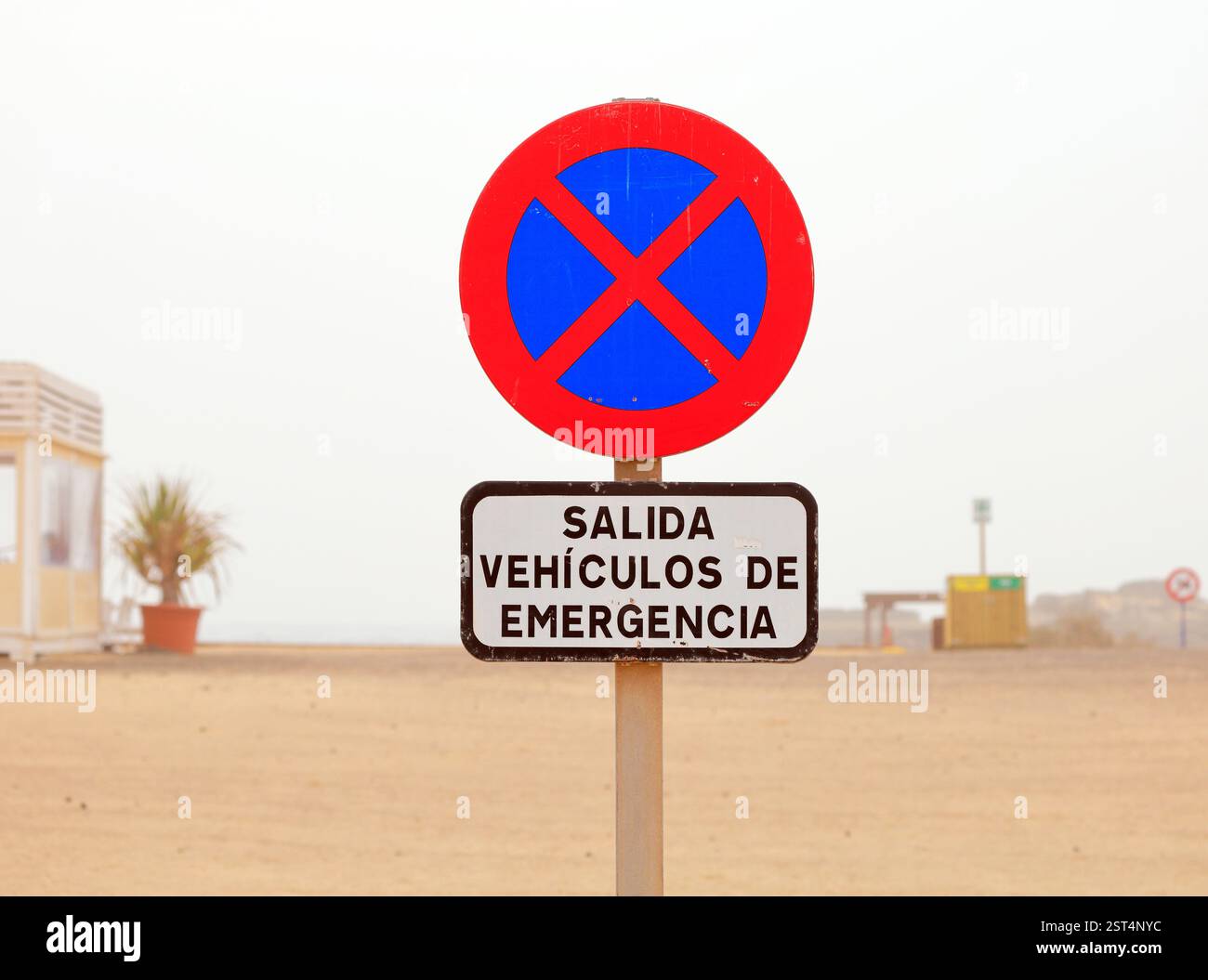 Emergency vehicles entrance only sign - Salida Vehiculos de Emergencia - Fuerteventura, Canary Islands, Spain, EU. Taken Winter December 2024 Stock Photo