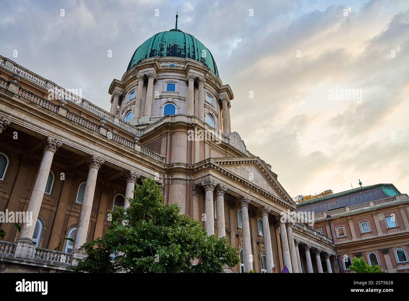 Historic Buda Castle with green dome and ornate columns in Budapest ...