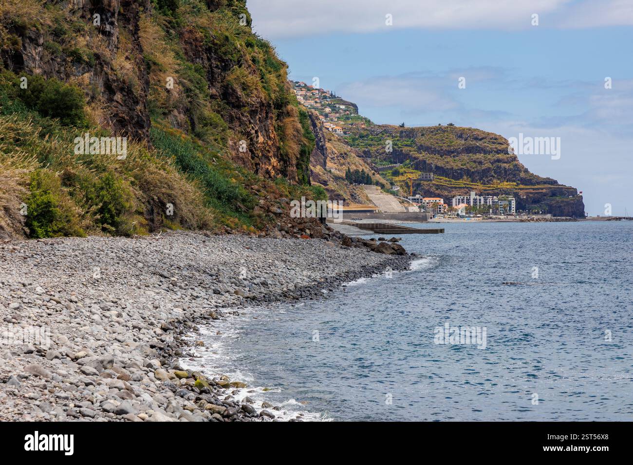Beach in Lugar de Baixo village on Madeira Island, Portugal. Ribeira Brava city on background Stock Photo