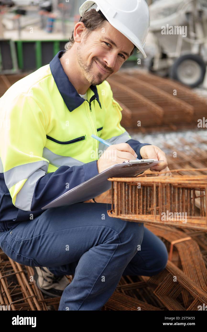 Building Inpector Pictures building inspector looking at new property Stock Photo - Alamy