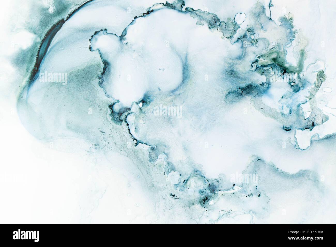Swirling blue patterns created with alcoholic ink, evoking fluidity and tranquility. Stock Photo