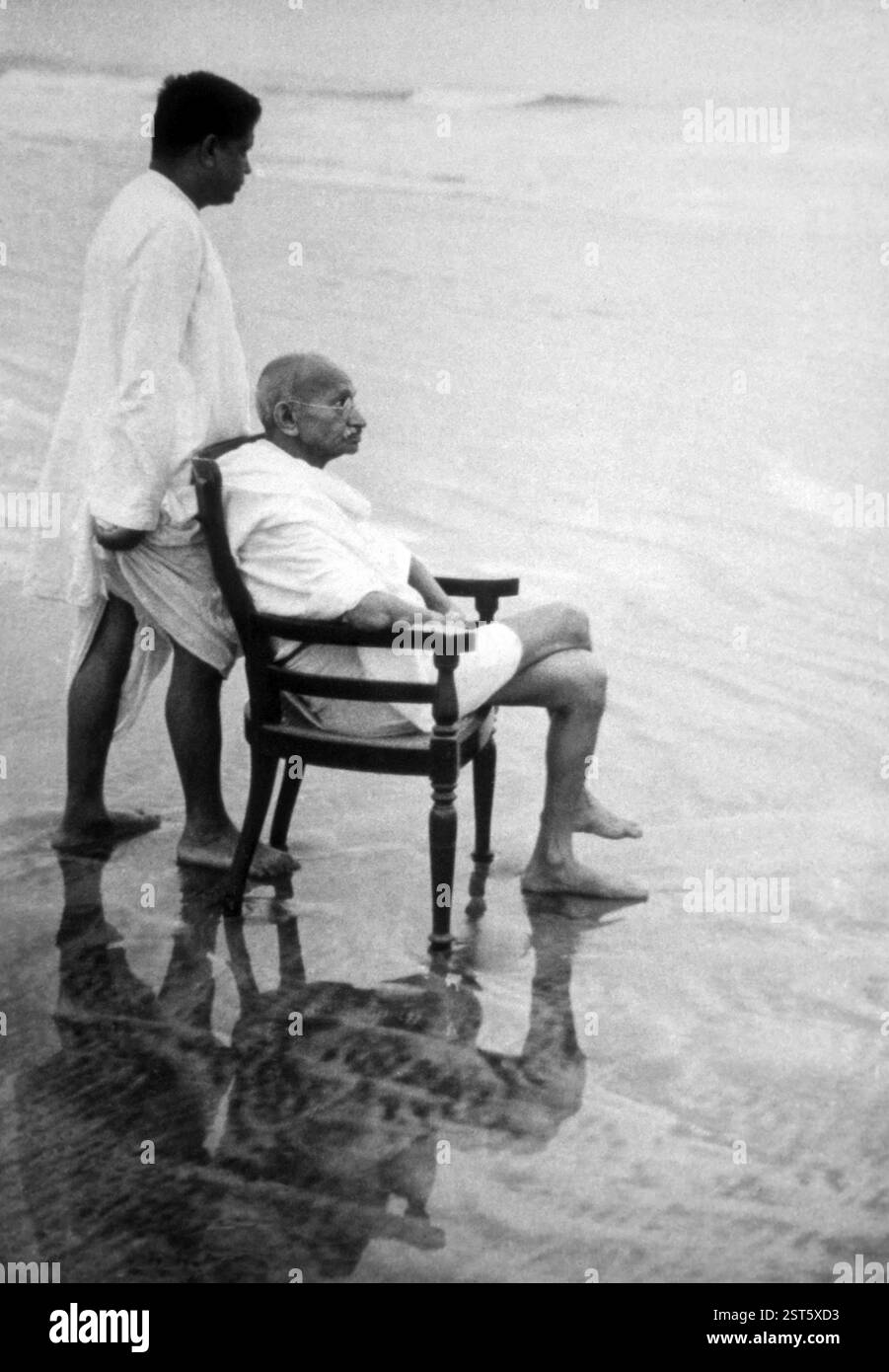 Freedom fighters mahatma gandhi with son devdas in juhu beach at mumbai, Maharashtra, India, Asia Stock Photo
