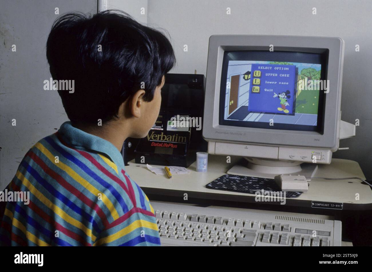Child on a Computer Stock Photo - Alamy