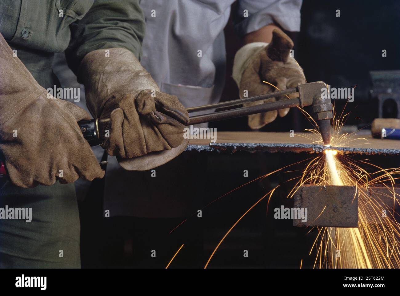 Cutting work in engineering industry, india Stock Photo - Alamy