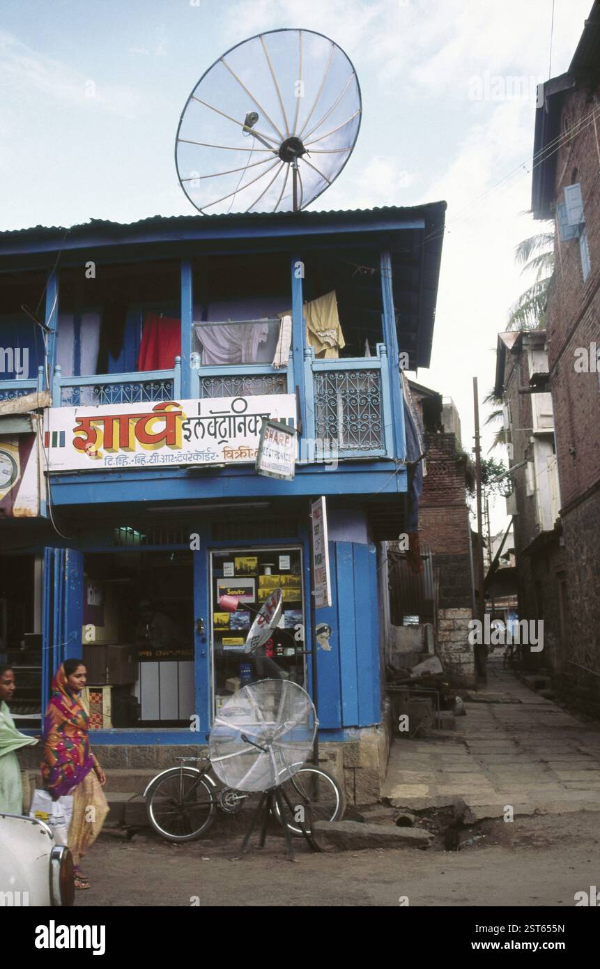 Dish Antenna fitted on top of house, maharashtra, india Stock Photo