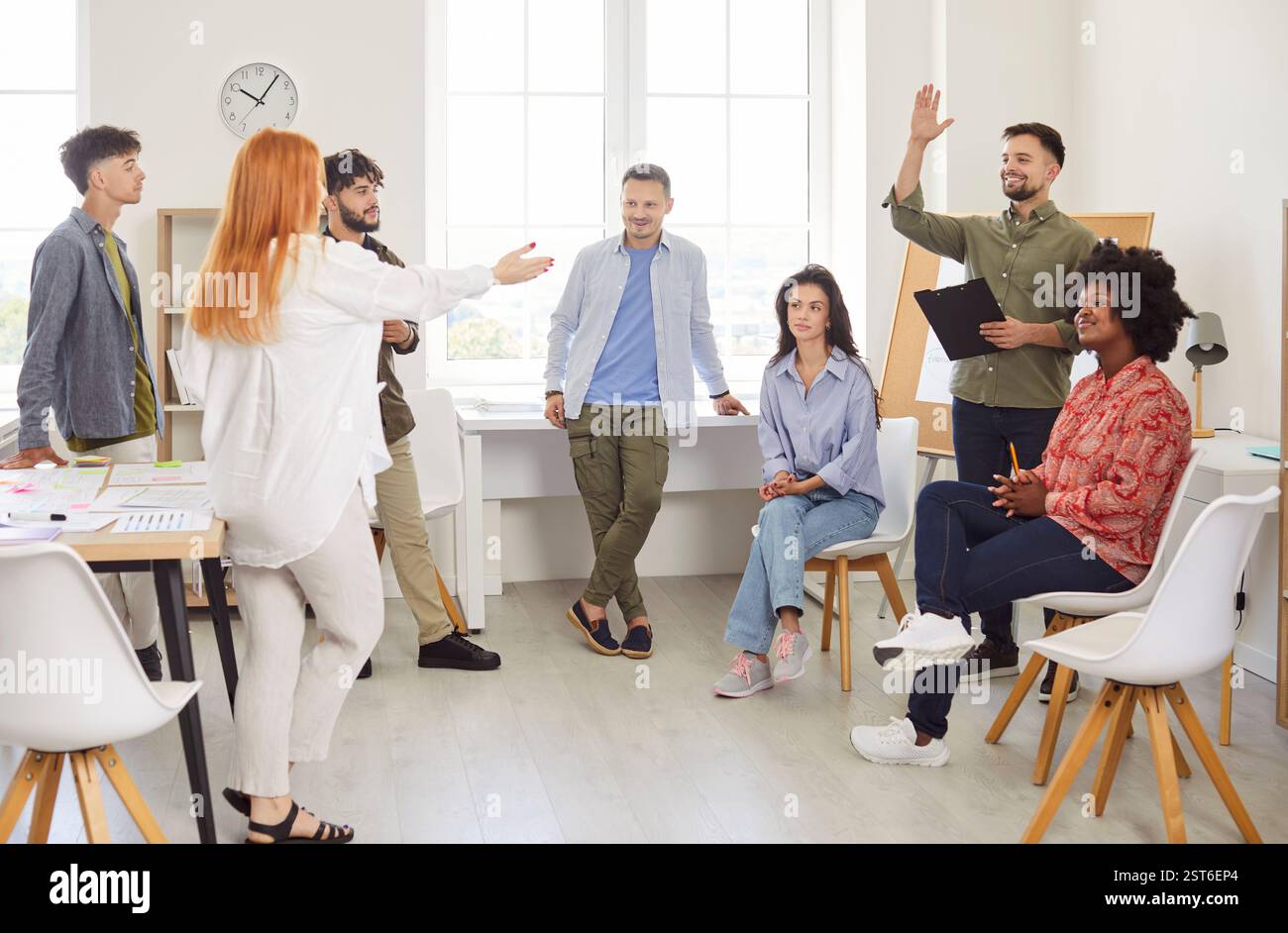 Business Team Raising Hands To Ask Questions During Office Presentation ...