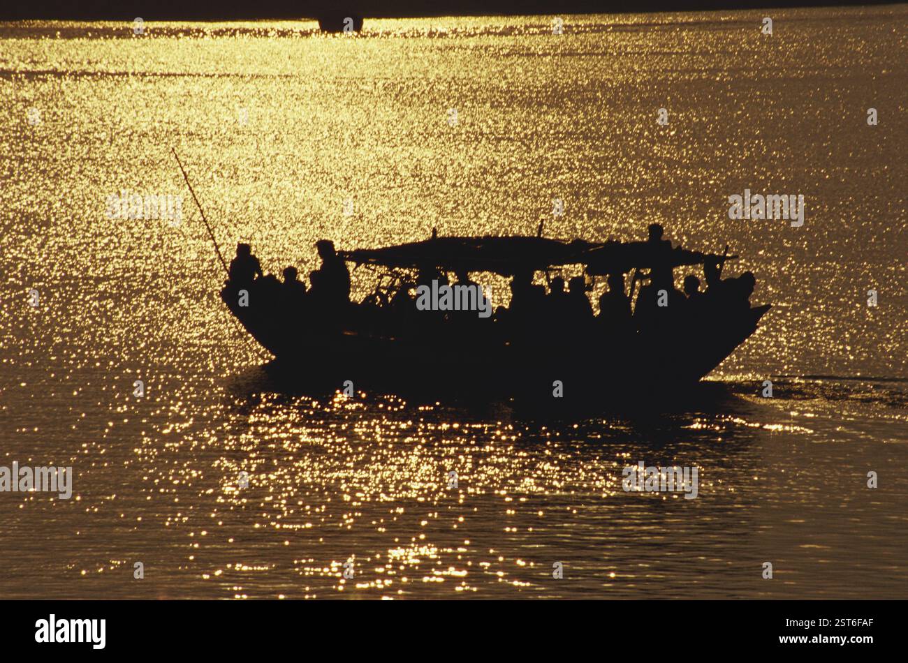 Boat sunset ganga calcutta hi-res stock photography and images - Alamy
