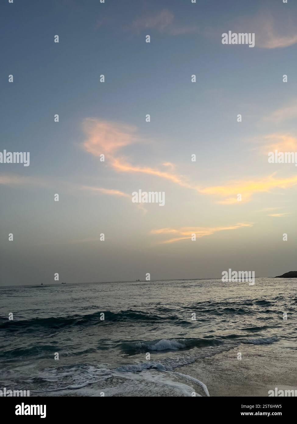 Serene Ocean Waves at Sunset - Smartphone Captured Stock Image