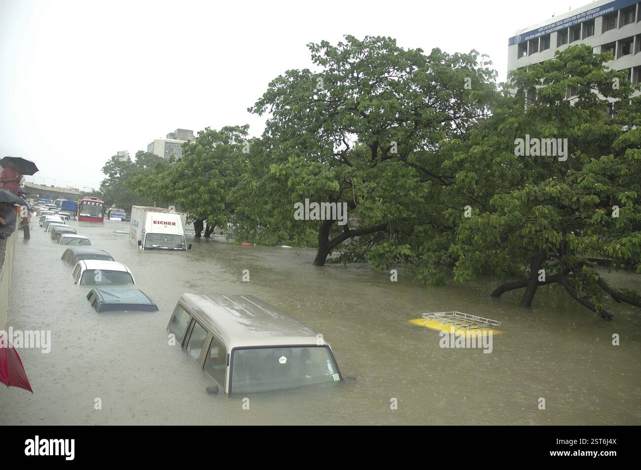 Floods due to heavy rain, showing submerged car in flooded water ...