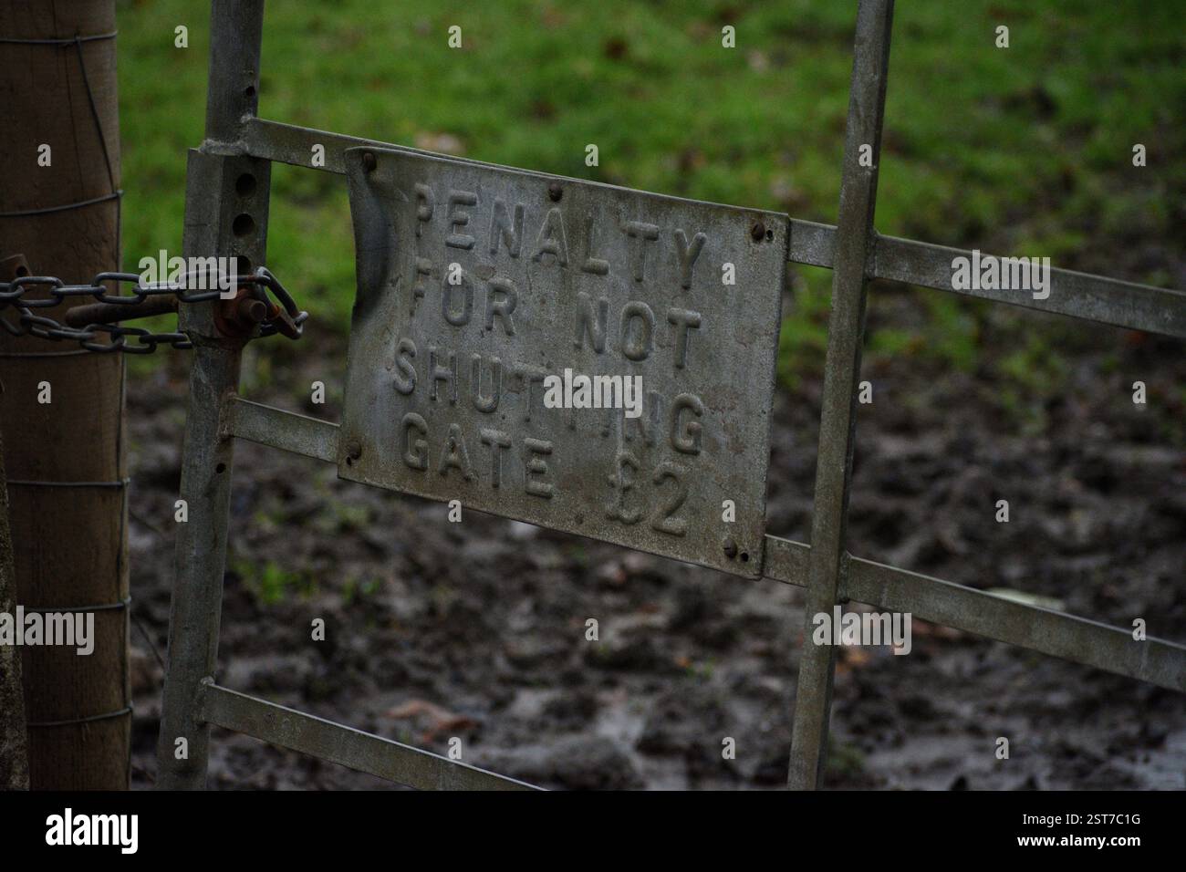 Penalty sign on the farm gate Stock Photo - Alamy