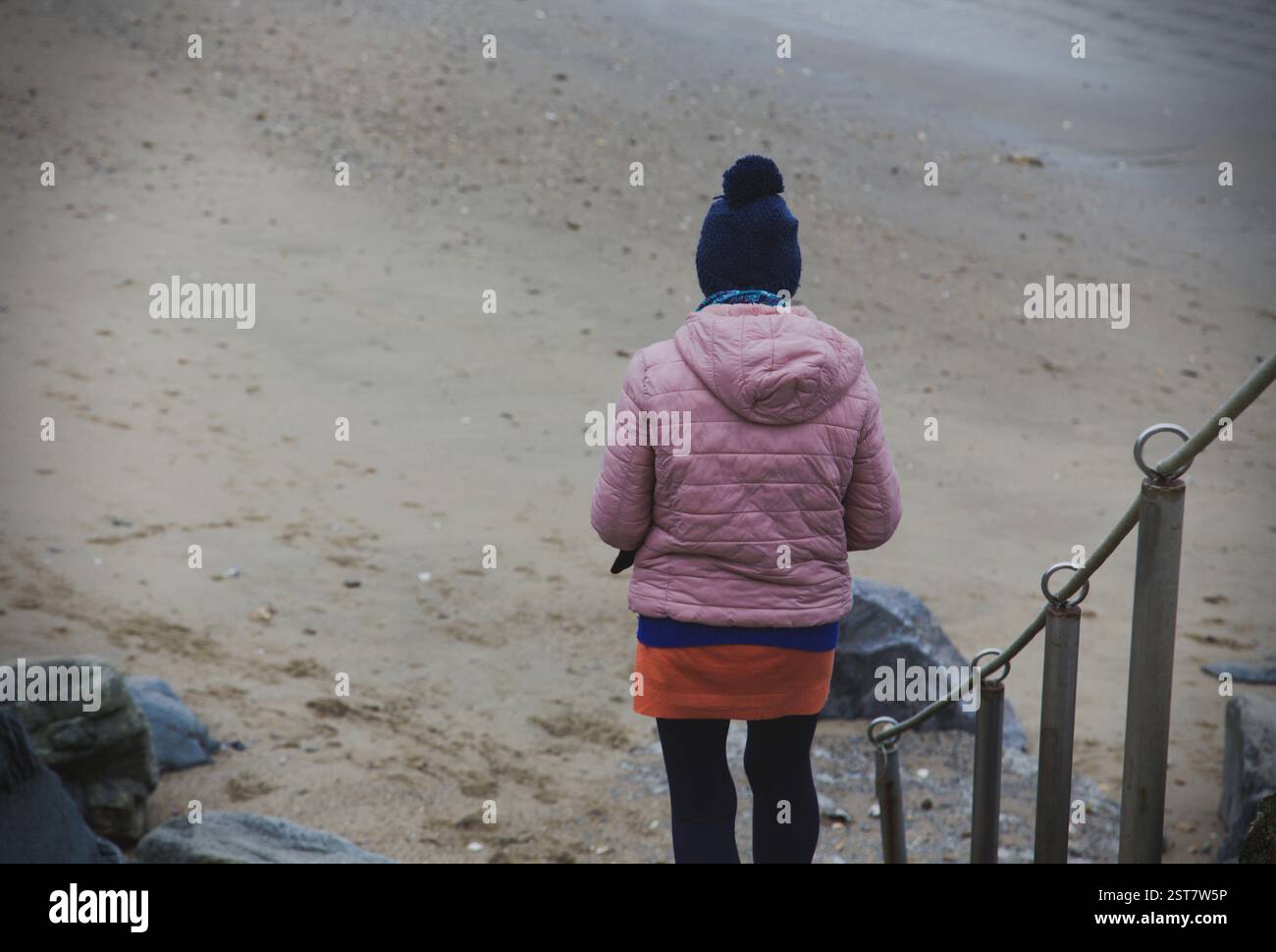 Penestin, France. 17th Feb, 2025. Walker on the beach in Penestin