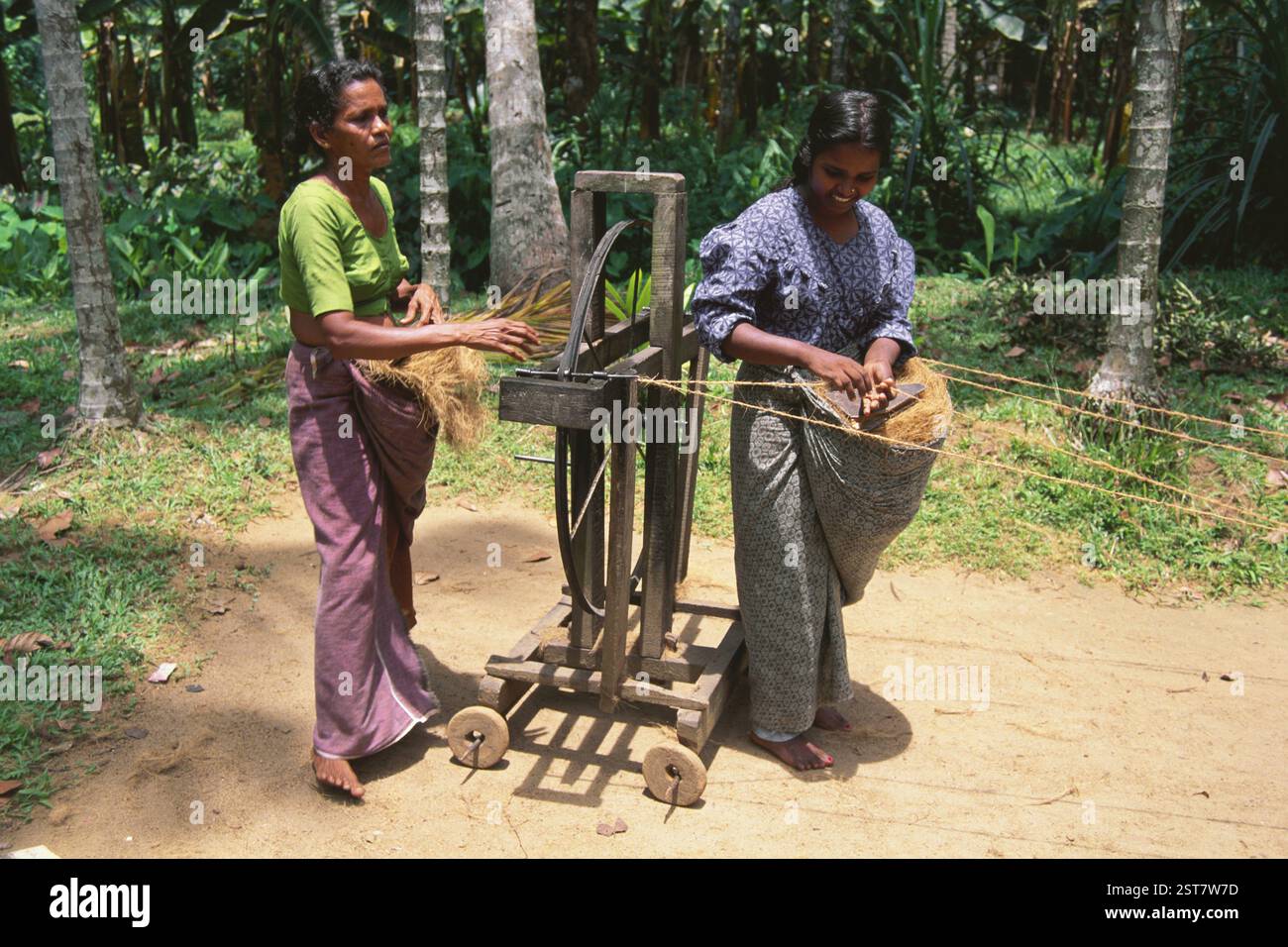 Women making coir ropes, kerala, india Stock Photo - Alamy