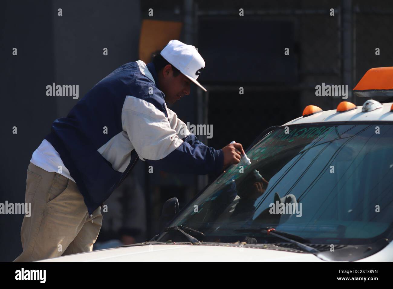 Mexico City, Mexico. 17th Feb, 2025. A person writes the legend 'No to Extortion' on a crane windshield on Zaragoza avenue who intended to demonstrate and march towards the main square Zocalo to demand the stop to robberies and extortions in the city. on February 17, 2025 in Mexico City, Mexico. (Photo by Carlos Santiago/ Eyepix Group/Sipa USA) Credit: Sipa USA/Alamy Live News Stock Photo