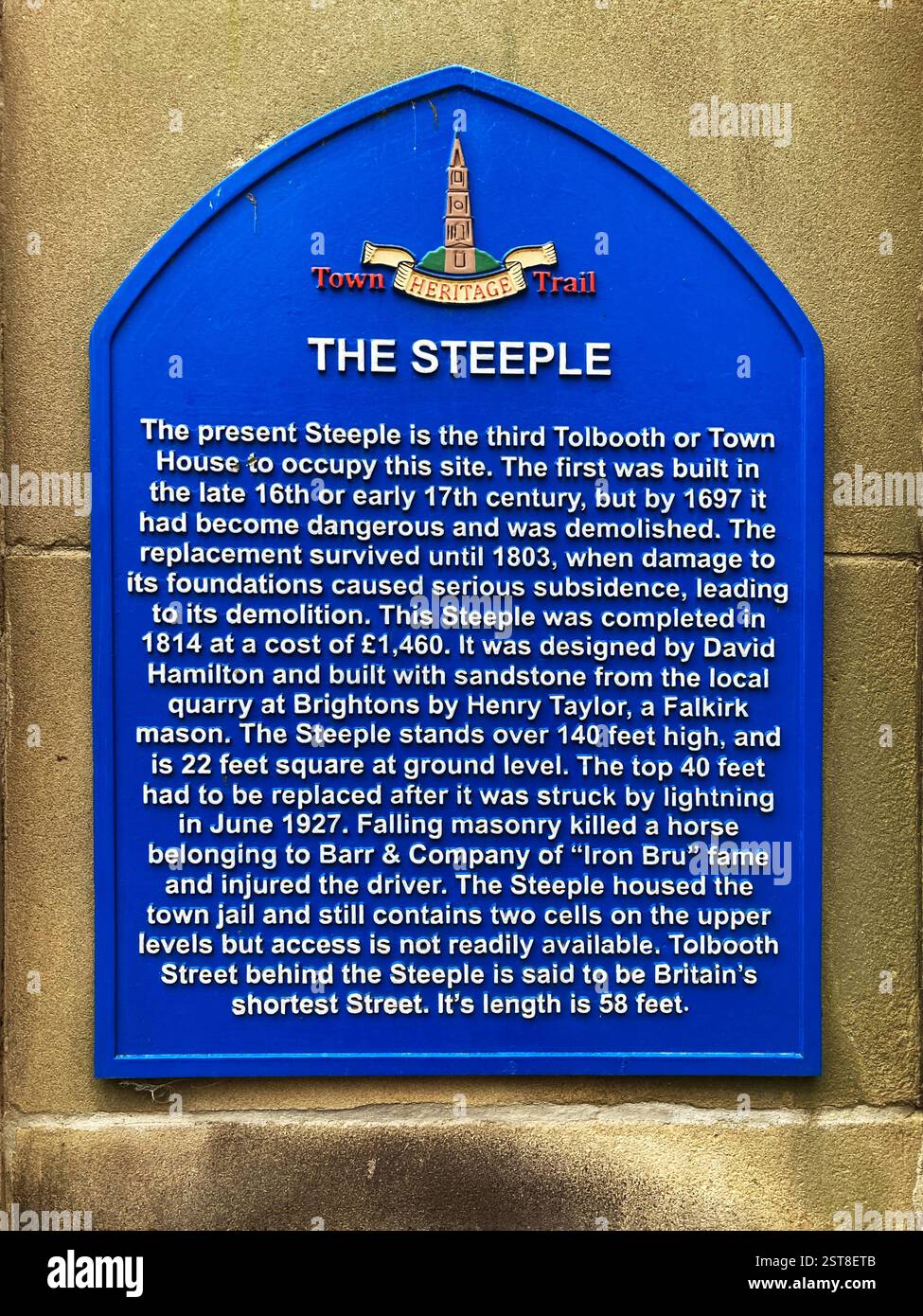 Blue Plaque with public information regarding the Falkirk Steeple, part of the Falkirk Town Heritage Trail, Falkirk High Street, Falkirk, Scotland - Smartphone Captured Stock Image