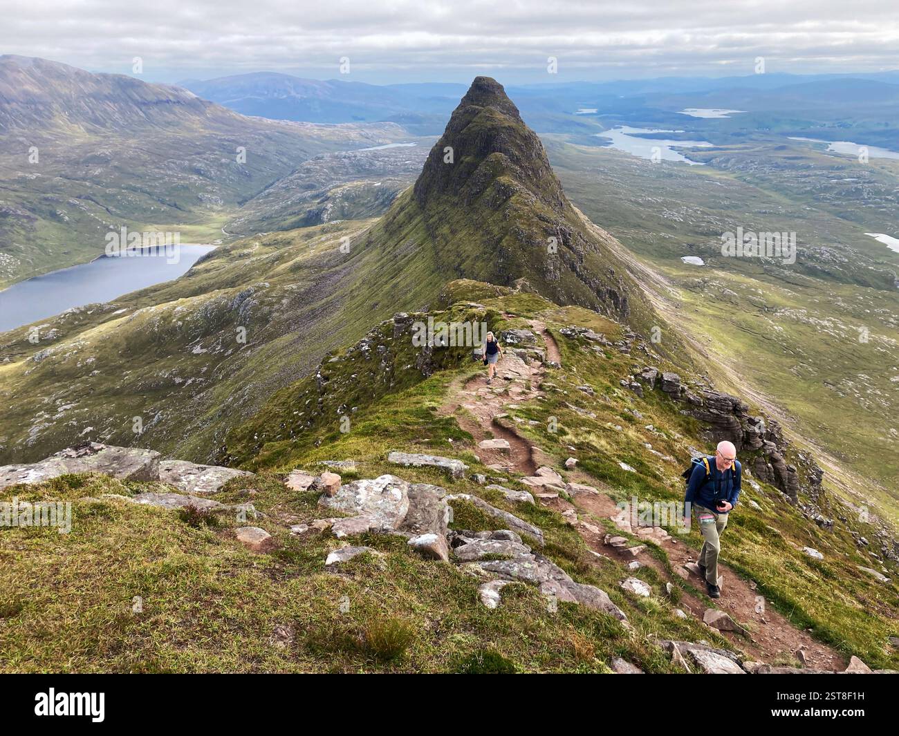Hikers on the iconic Scottish mountain Suilven looking east, Inverpolly Sutherland, Scotland - Smartphone Captured Stock Image