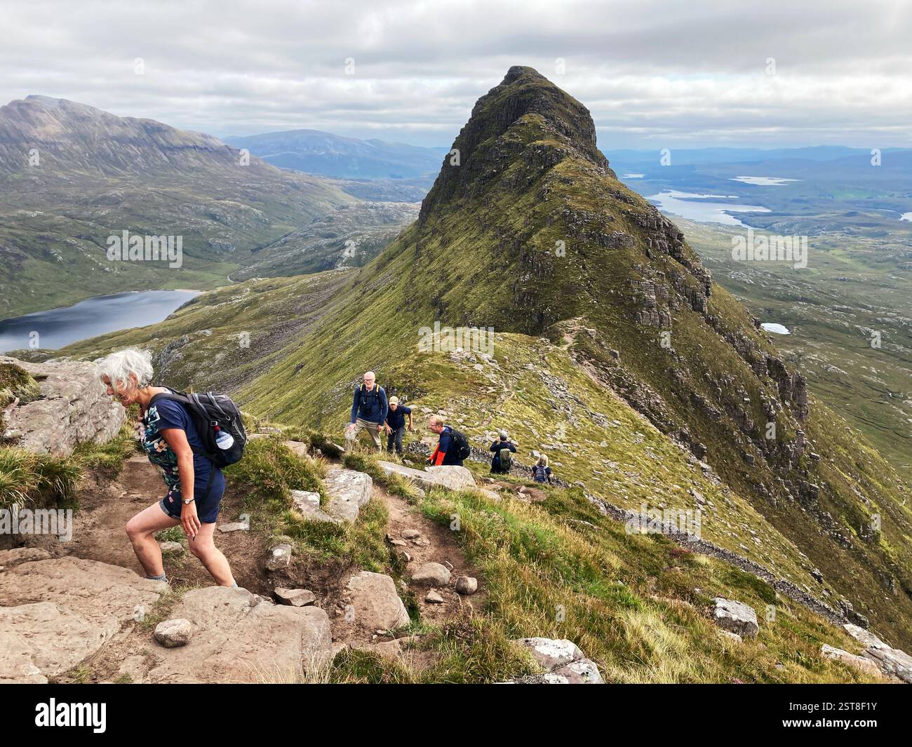 Hikers on the iconic Scottish mountain Suilven looking east, Inverpolly Sutherland, Scotland - Smartphone Captured Stock Image