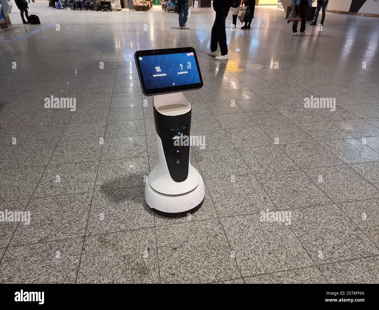 Temi airport robot, digital assistant, AI assistant in the terminal of Eindhoven Airport, the Netherlands; Robot as a Service, AI in Motion - Smartphone Captured Stock Image
