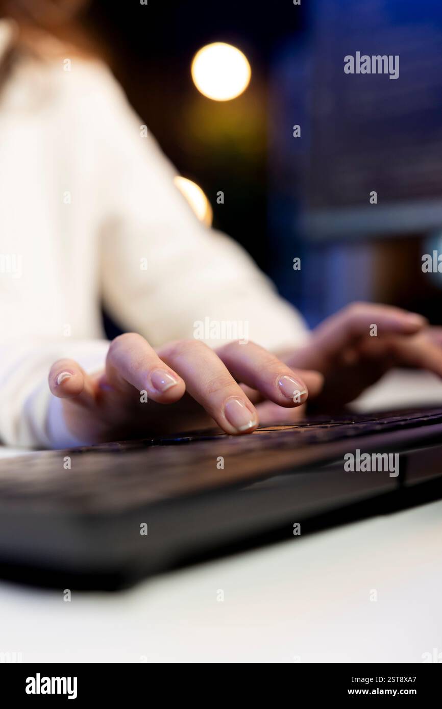 Freelancing computer scientist typing on keyboard, implementing security measures to protect company data. Close up shot of remote IT worker testing and debugging code for software applications Stock Photo