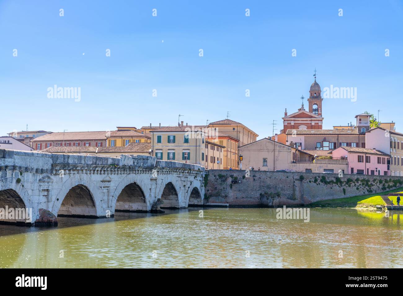 Rimini's ancient bridge over the river, sunny day Stock Photo