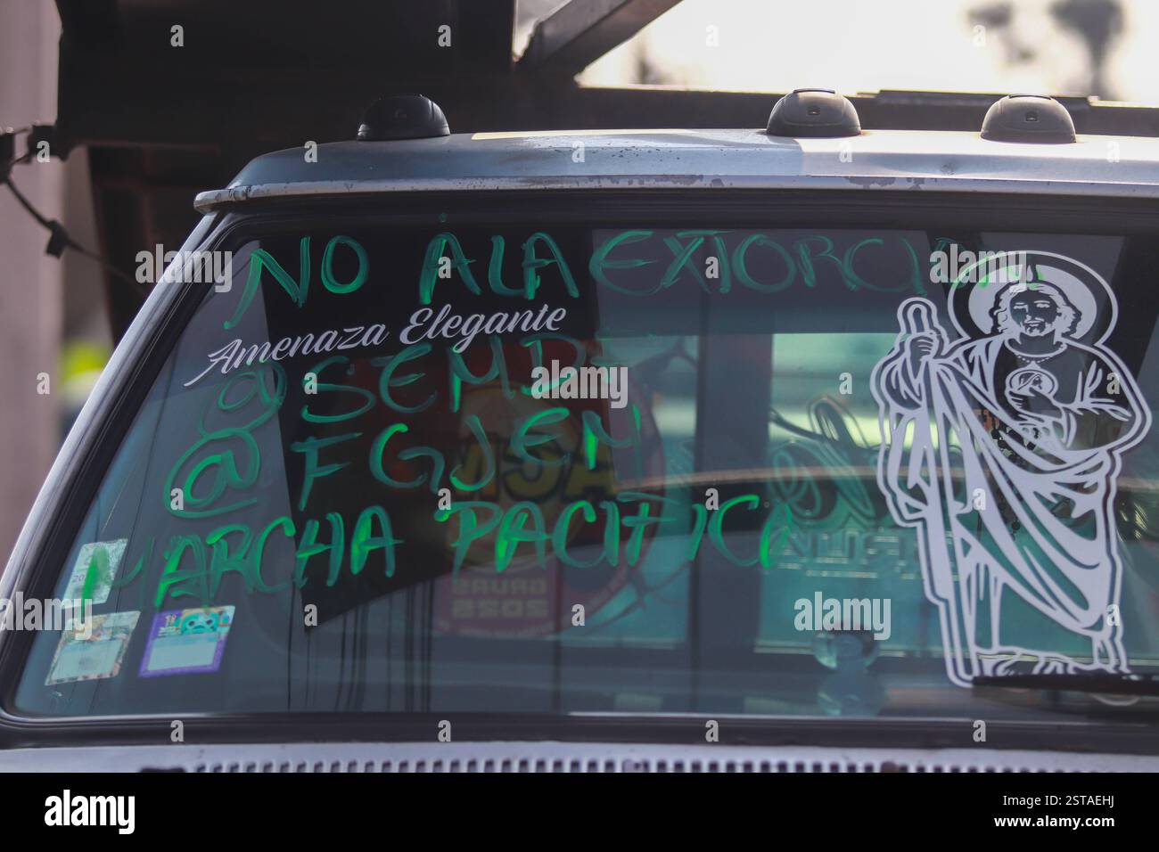 Riot Police Stop The Crane Drivers Demonstration detail of a windshield with the legend No to Extortion on Zaragoza avenue who intended to demonstrate and march towards the main square Zocalo to demand the stop to robberies and extortions in the city. on February 17, 2025 in Mexico City, Mexico. Mexico City CDMX Mexico Copyright: xCarlosxSantiagox Stock Photo