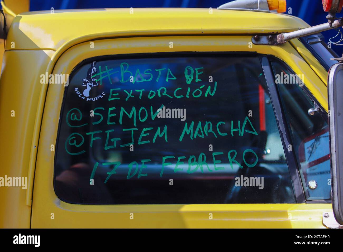 Riot Police Stop The Crane Drivers Demonstration detail of a windshield with the legend No to Extortion on Zaragoza avenue who intended to demonstrate and march towards the main square Zocalo to demand the stop to robberies and extortions in the city. on February 17, 2025 in Mexico City, Mexico. Mexico City CDMX Mexico Copyright: xCarlosxSantiagox Stock Photo