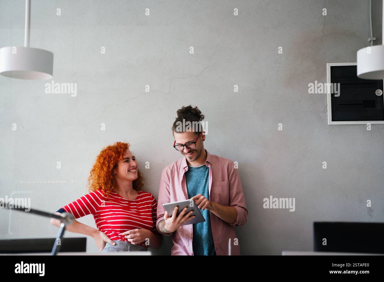 Software, coding and business woman on tablet thinking of data analytics, digital technology. Stock Photo