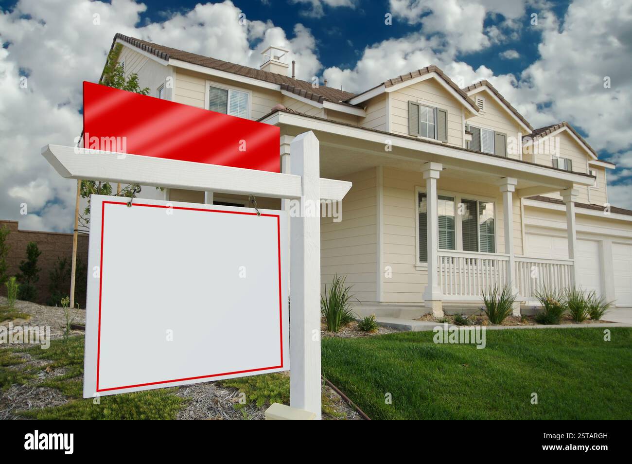 Blank Real Estate Sign in Front of Beautiful New Home Stock Photo - Alamy
