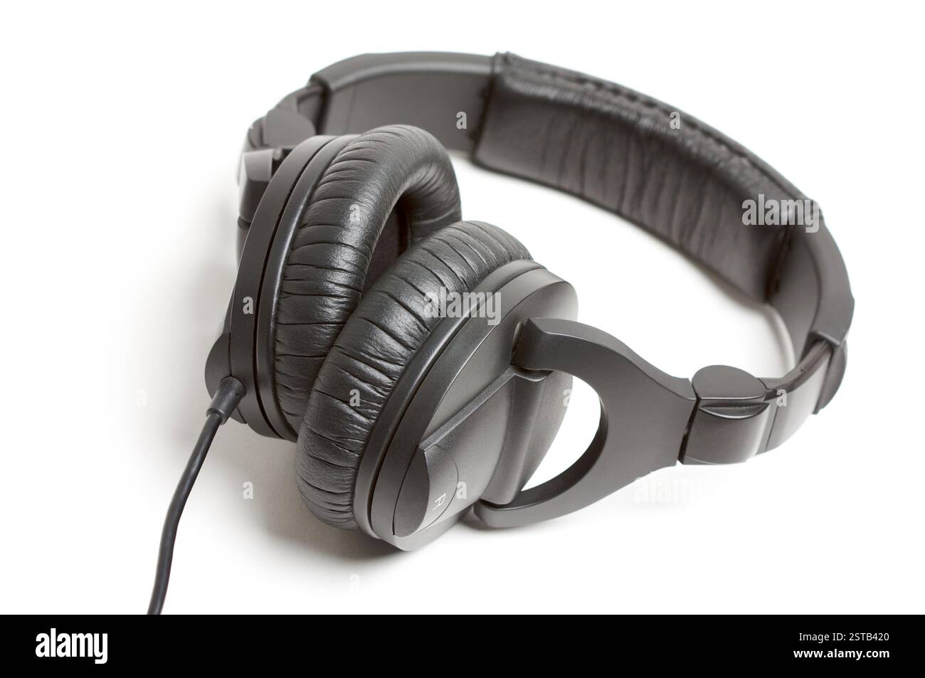 Black headphones on white hi-res stock photography and images - Alamy