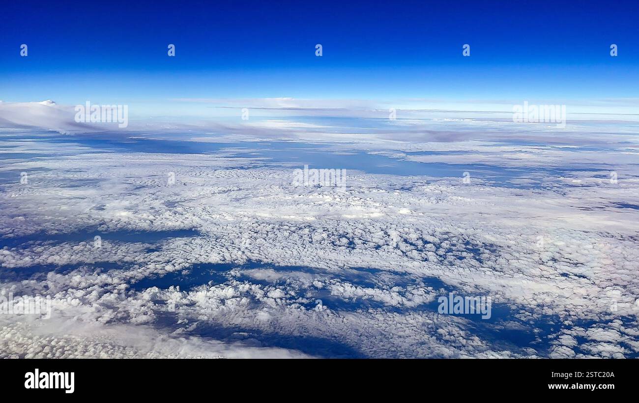 Cloudscape seen froma holiday jet, No people, Travel concept, Background. Copy space. - Smartphone Captured Stock Image