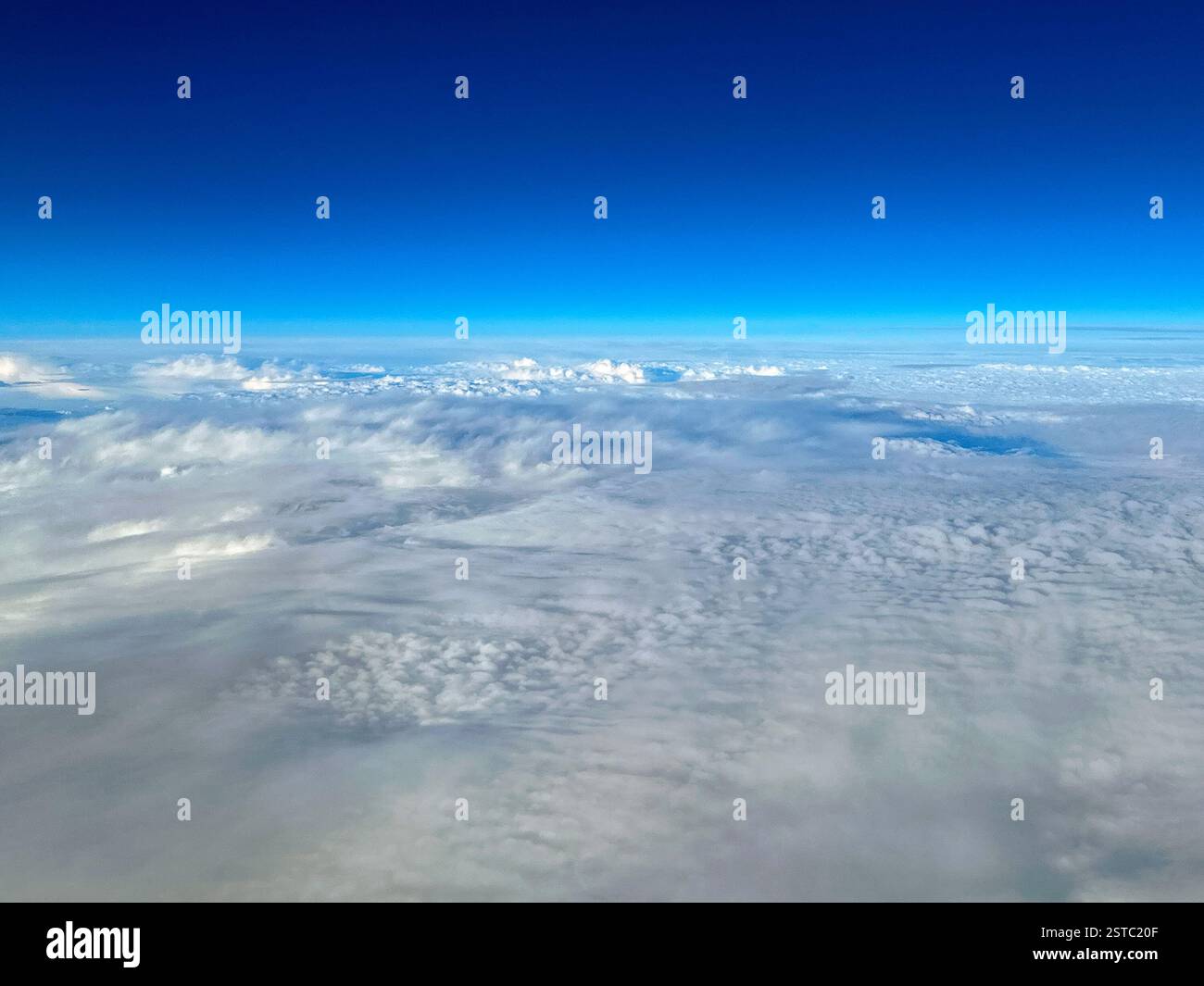 Cloudscape seen froma holiday jet, No people, Travel concept, Background. Copy space. - Smartphone Captured Stock Image