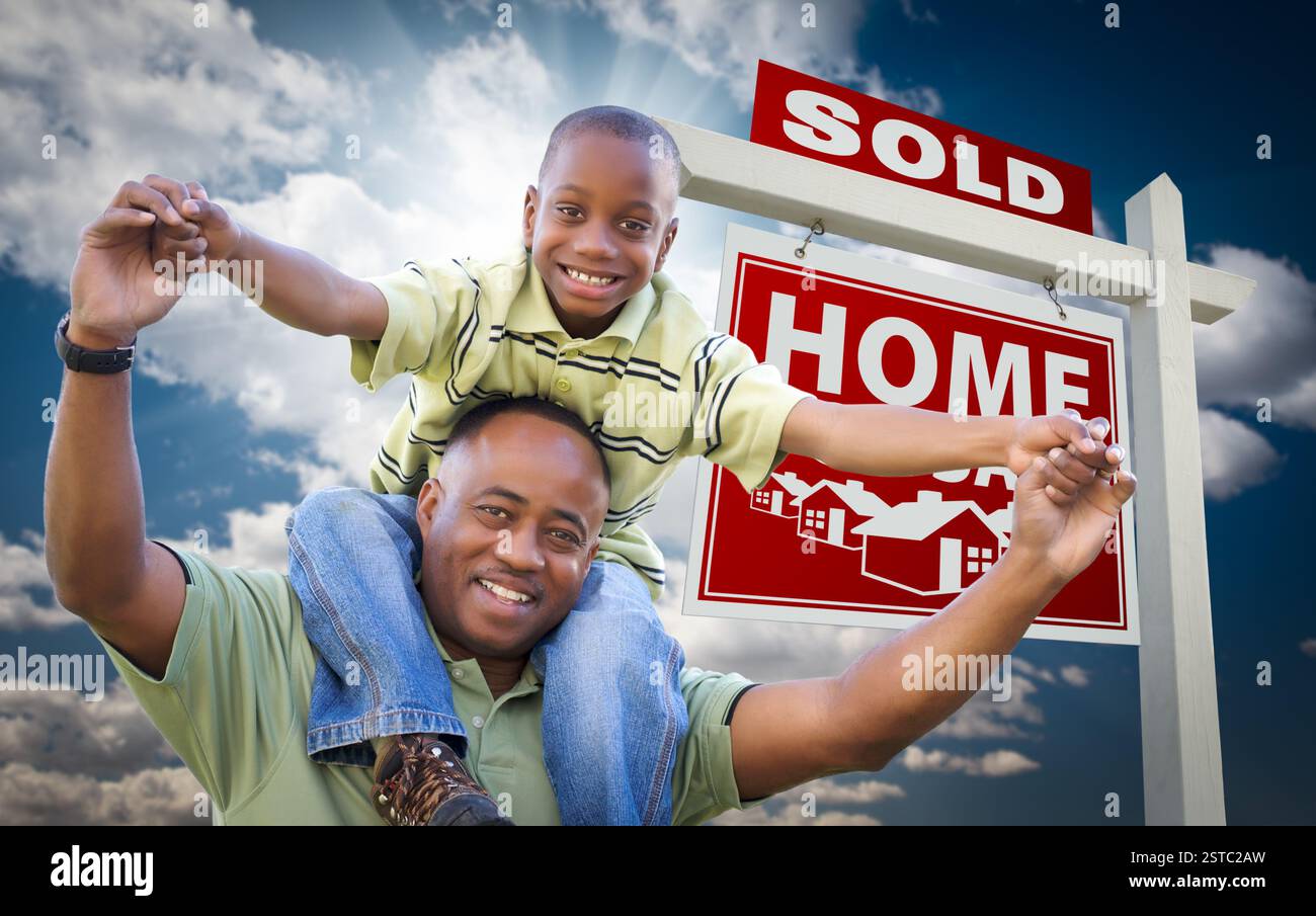 African American Father with Son In Front of Sold Home For Sale Real ...