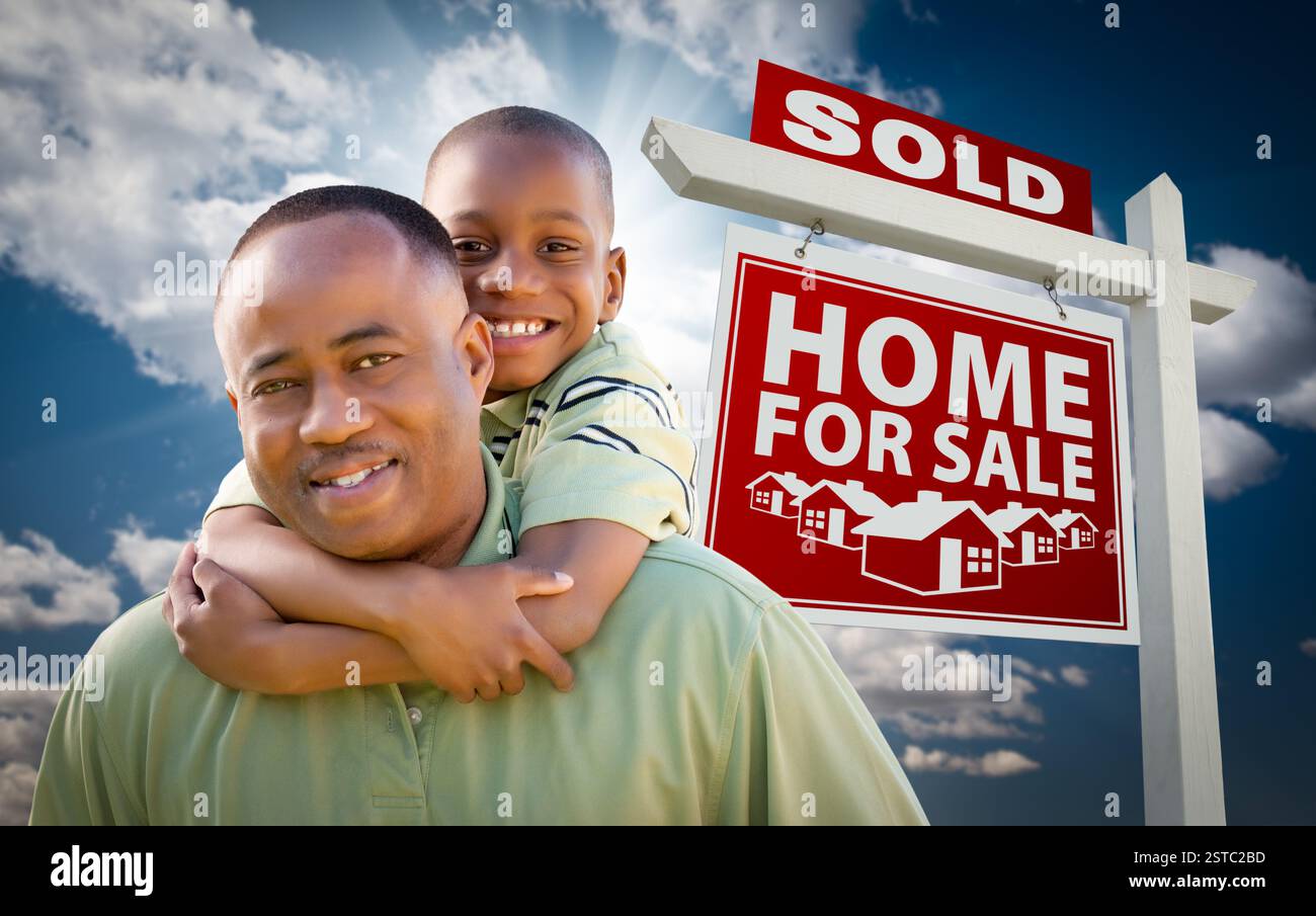 African American Father with Son In Front of Sold Home For Sale Real ...
