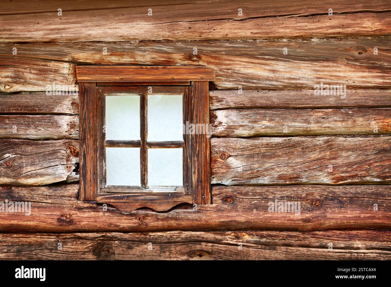 A small window in the wall of an old wooden house Stock Photo - Alamy