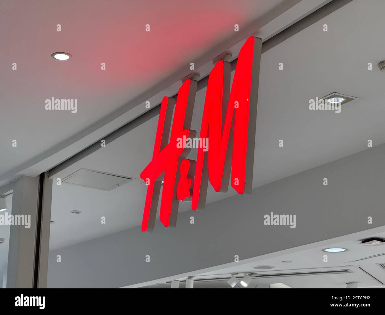 Guangzhou, China - Jan 27, 2024: HM store logo. HM Hennes and Mauritz AB, also known as HM Group, is a multinational clothing company. - Smartphone Captured Stock Image Guangzhou, China - Jan 27, 2024: HM store logo. HM Hennes and Mauritz AB, also known as HM Group, is a multinational clothing company. - Smartphone Captured Stock Image
