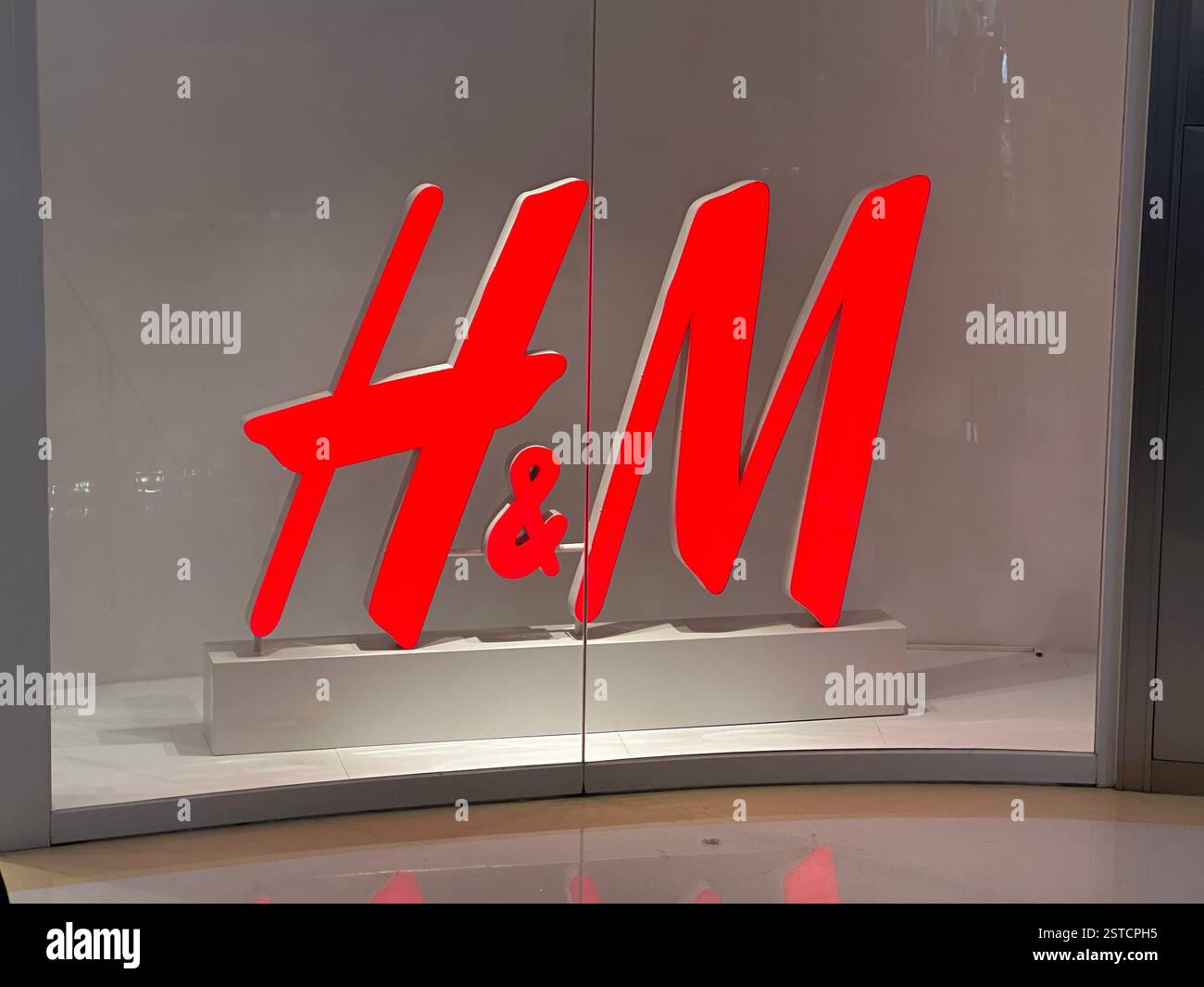 Guangzhou, China - Jan 27, 2024: H&M store sign. H&M Hennes & Mauritz AB, also known as HM Group is a multinational clothing company. - Smartphone Captured Stock Image Guangzhou, China - Jan 27, 2024: H&M store sign. H&M Hennes & Mauritz AB, also known as HM Group is a multinational clothing company. - Smartphone Captured Stock Image