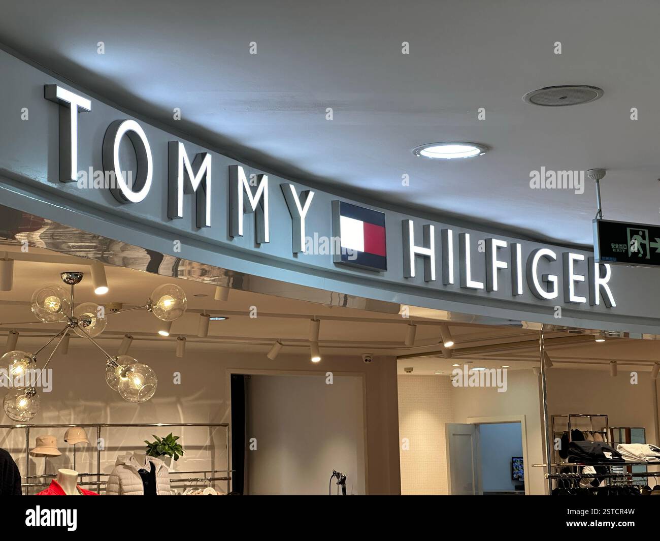 Guangzhou, China - Jan 27, 2024: Tommy Hilfiger store sign. - Smartphone Captured Stock Image