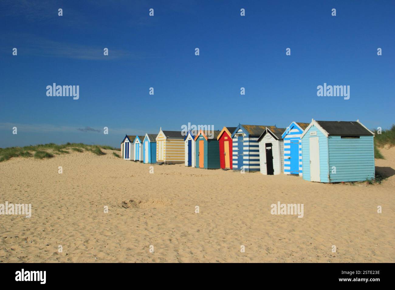 Southwold beach. Beach huts on Southwold beach in summer, Suffolk, UK. Stock Photo