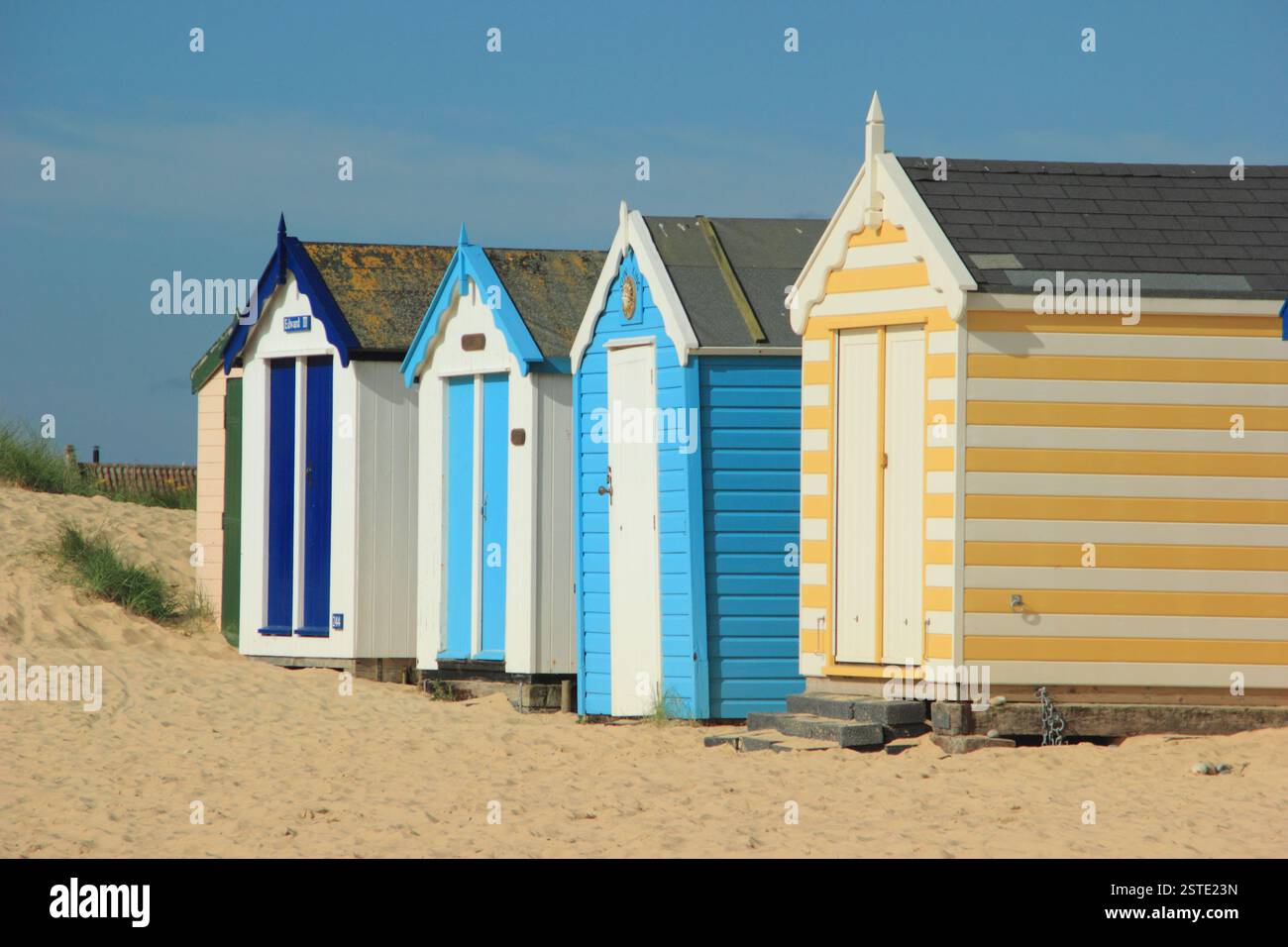 Southwold beach. Beach huts on Southwold beach in summer, Suffolk, UK. Stock Photo