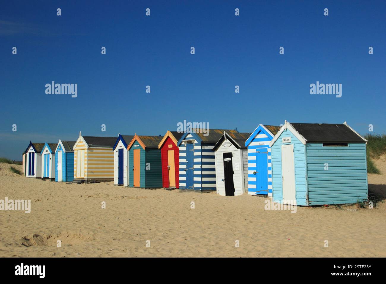 Southwold beach. Beach huts on Southwold beach in summer, Suffolk, UK. Stock Photo