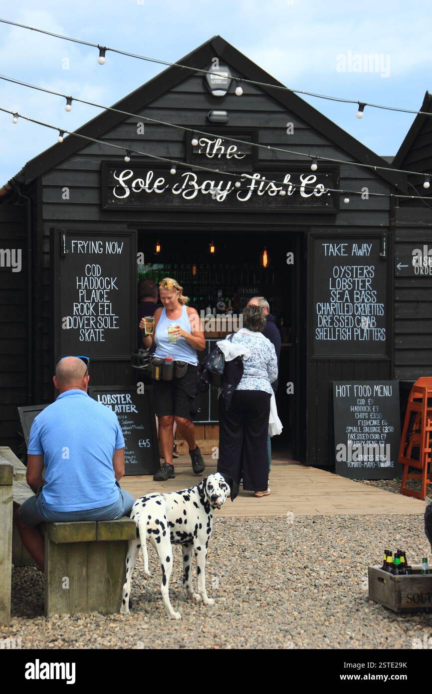 Southwold harbour, Suffolk. Patrons at The Sole Bay Fish Company at Southwold harbour, Suffolk, UK Stock Photo