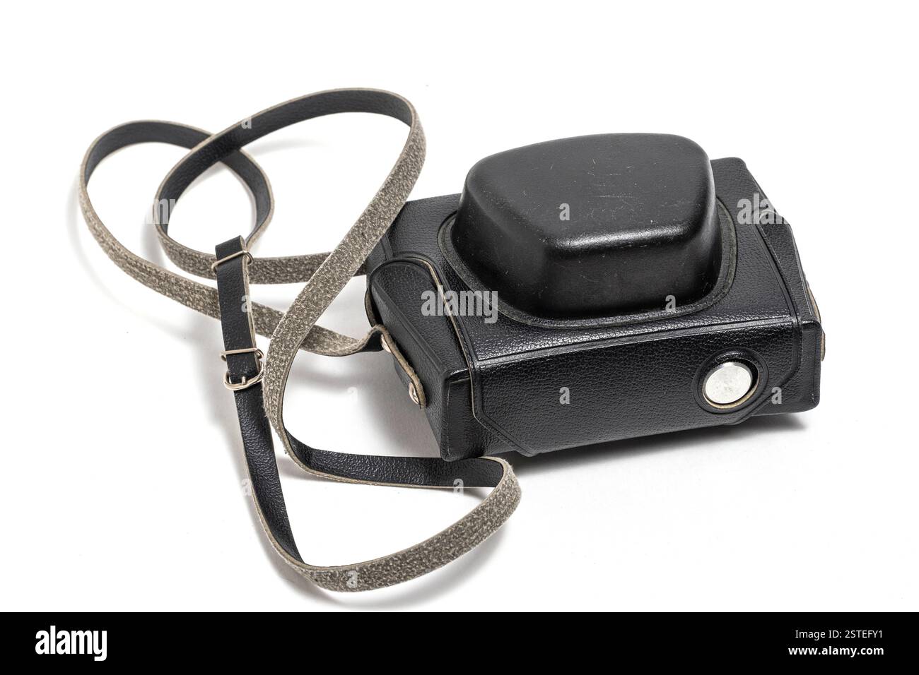 Black camera case with strap on white background. Closeup Stock Photo