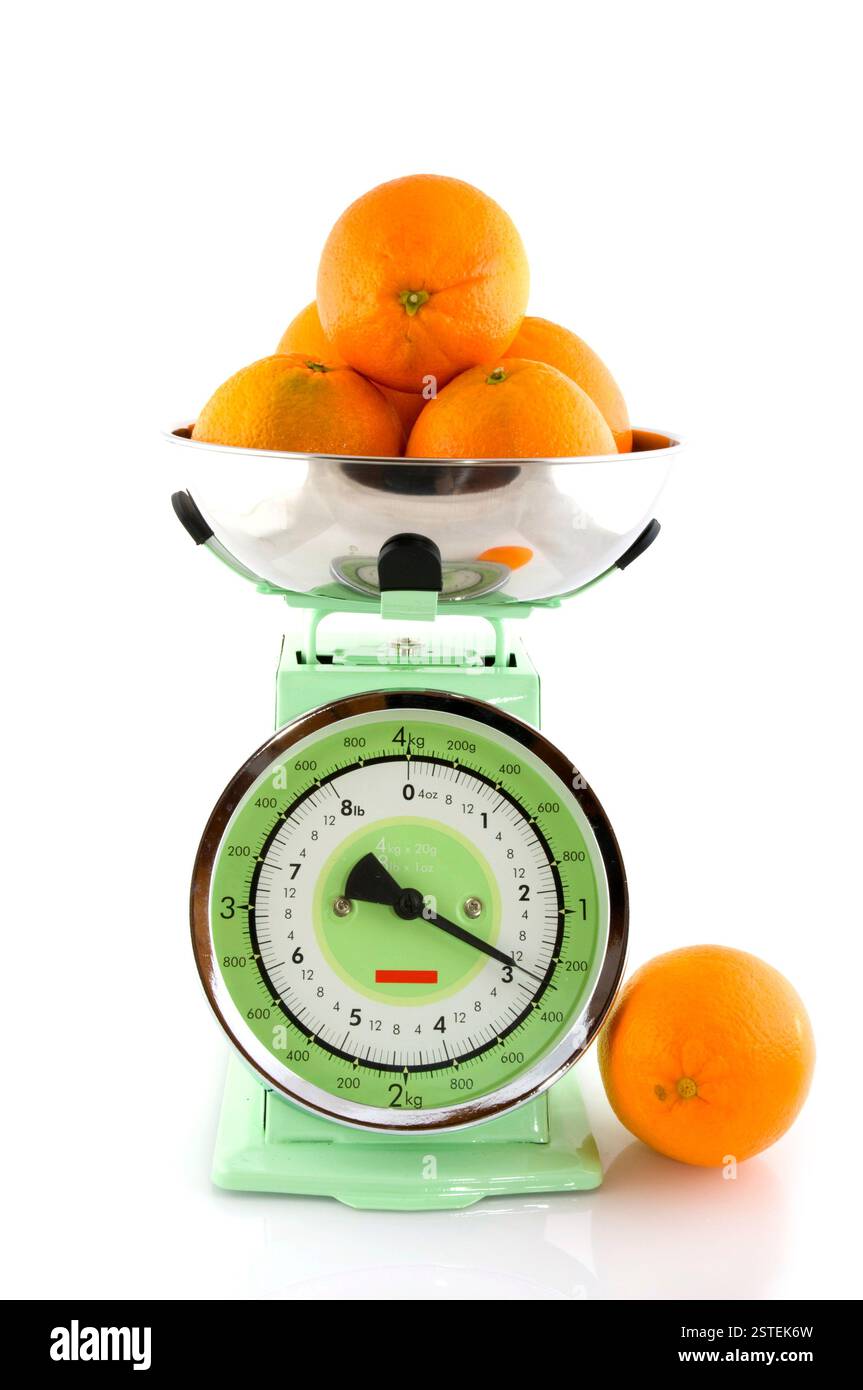 Scale for the kitchen with fruit Stock Photo