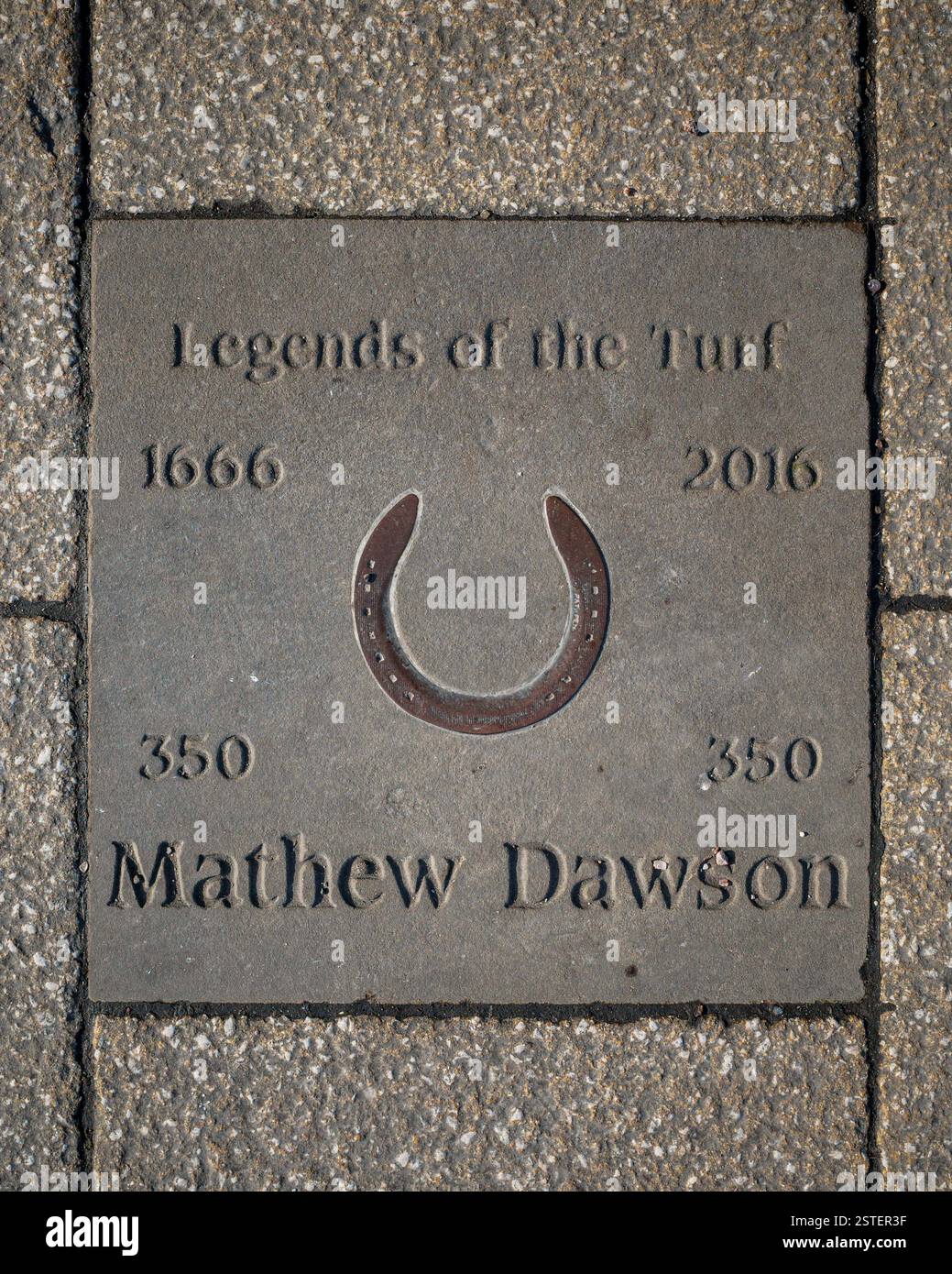 Legends of the Turf Newmarket - Newmarket's 'Walk of Fame' - commemorative paving slabs laid in Newmarket High Street. Matthew Dawson - Trainer Stock Photo