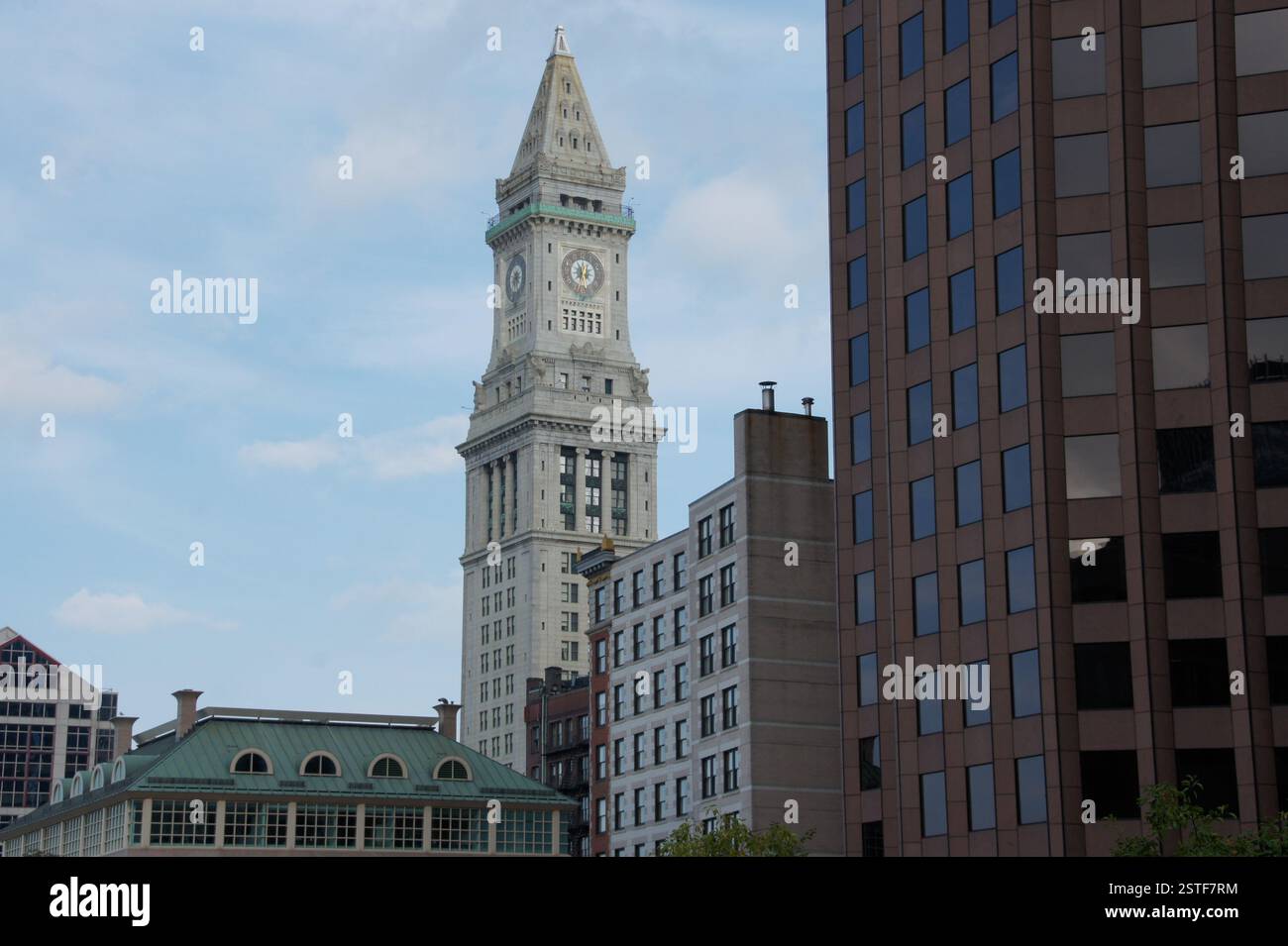 Boston Custom House Tower, a clock tower with a weathervane, stands as ...
