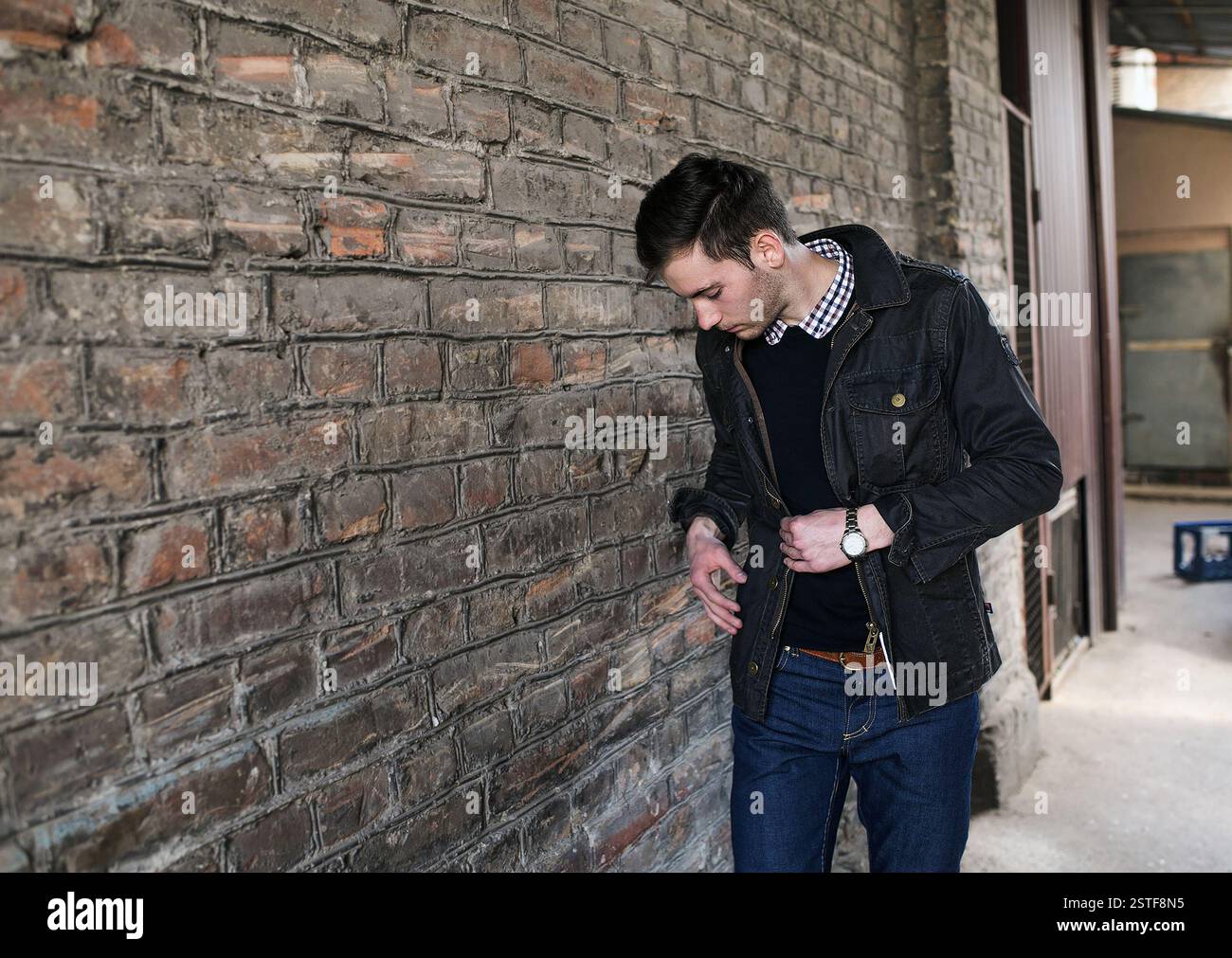 Confident man posing in selvedge  jeans Stock Photo