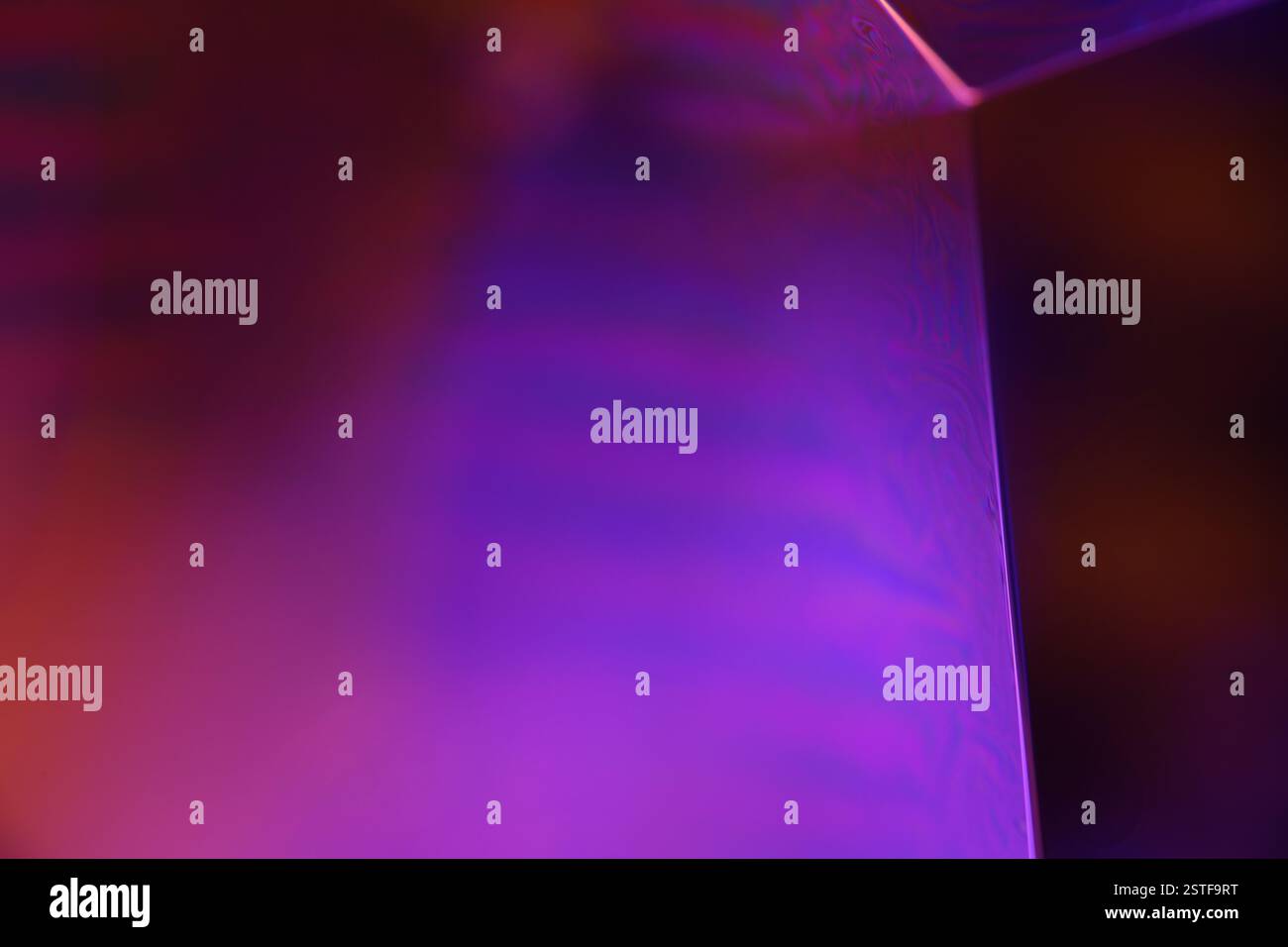 Purple liquid pattern on black background, fluid motion, dark horror background, liquid in macro, flat gradient Stock Photo